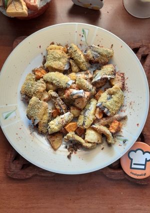 Φωτογραφία της συνταγής Fish and chips φούρνου με γαύρο