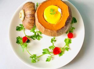 Hình của món BÍ ĐỎ HẤP GÀ.