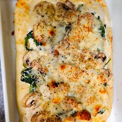 A picture of Spinach and Mushroom Pizza.
