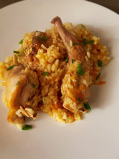 Una foto de Conejo con arroz