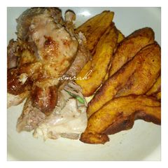 A picture of Roasted chicken breast with fried plantain.