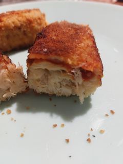 Une photo de Poisson pané maison à la tomate