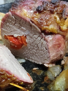 Una foto de Colita de cuadril rellena con ají