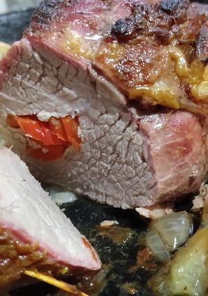 Una foto de Colita de cuadril rellena con ají