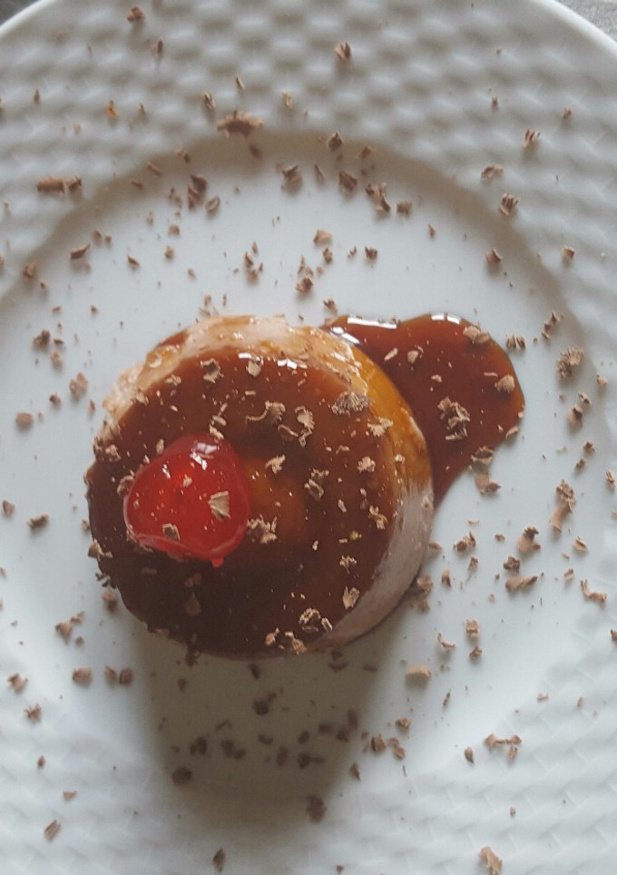 Una foto de Flan de fresa