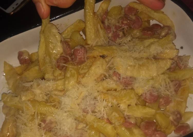 Papas fritas con salsa 4 quesos