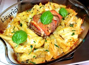O poză a rețetei Cotlet de porc Caprese și cartofi cu cașcaval la cuptor.