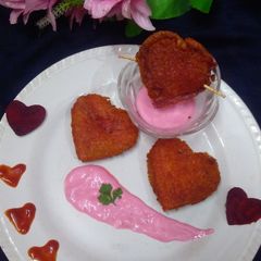 A picture of Beetroot bread roll hearts.