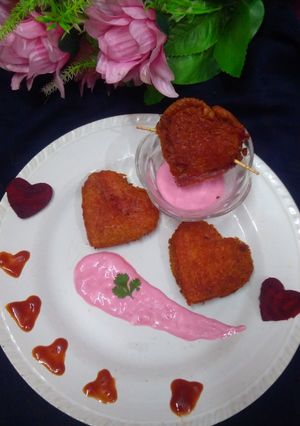 A picture of Beetroot bread roll hearts.