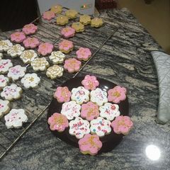 A picture of Almond Cookies with royal icing.