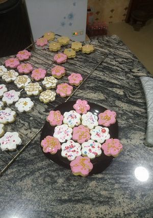 A picture of Almond Cookies with royal icing.