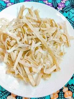 A picture of Homemade pasta (fettuccine) from scratch.