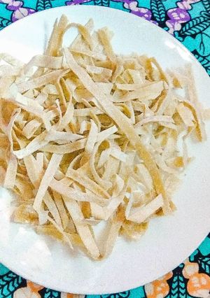 A picture of Homemade pasta (fettuccine) from scratch.