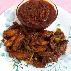 A picture of Schezwan Chilli Potatoes.