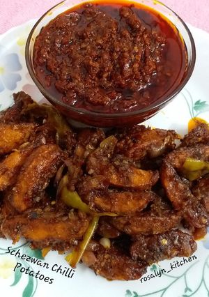 A picture of Schezwan Chilli Potatoes.