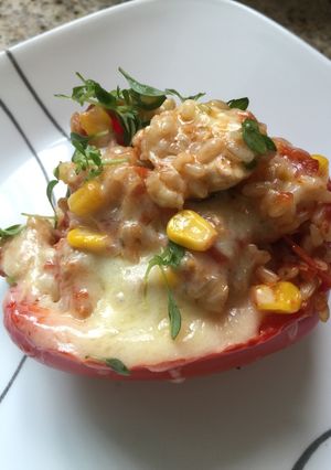 A picture of Chicken stuffed bell peppers.