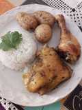 Pollo al horno con papitas, especias y mantequilla