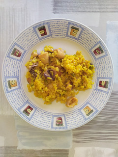 Una foto de Arroz con chipirones y mejillones