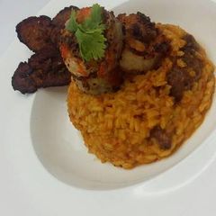 A picture of Jollof risotto rice.