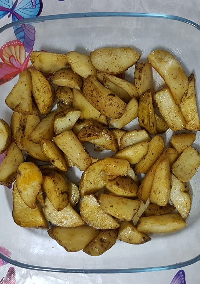 Una foto de Patatas al horno especiadas 👌