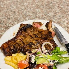 A picture of Medium T-Bone steak.