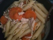 A picture of chicken noodle soup broth