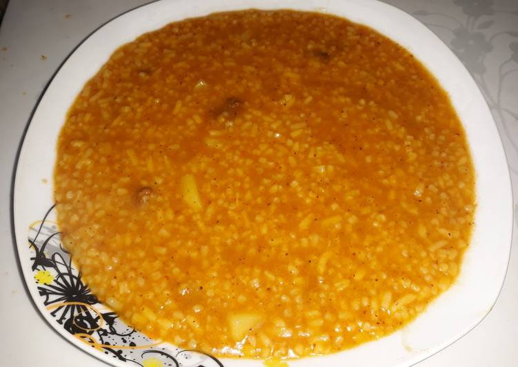 Step-by-Step Guide to Prepare Quick Arroz, papa, alverjas &#34;Majadito casero&#34;