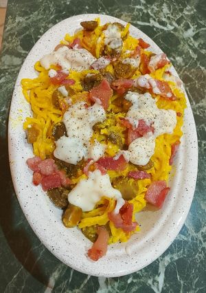 Foto di Spaghetti con Funghi Champignon Guanciale Crema di Parmigiano e Oro di Zafferano e Curcuma