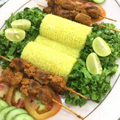 A picture of Tandoori Mutton Boti & Garlic Rice 🍚.
