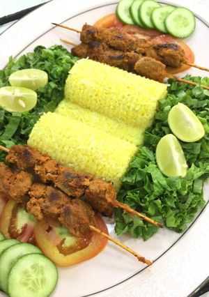 A picture of Tandoori Mutton Boti & Garlic Rice 🍚.