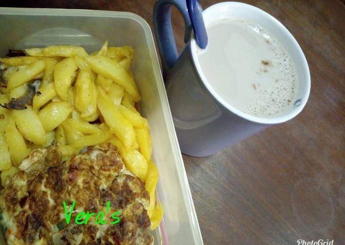 Irish potato chips, fried egg and beverage