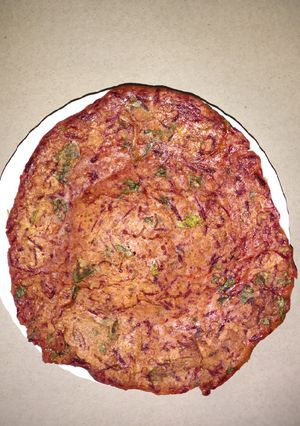 A picture of Oats besan beetroot chilla.