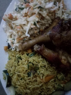 A picture of Butter Fried rice and coleslaw.