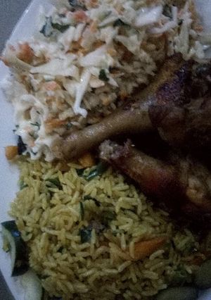 A picture of Butter Fried rice and coleslaw.