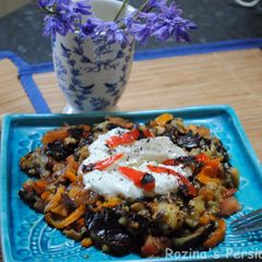 A picture of Turkish Grilled eggplant salad with yogurt-mint sauce.