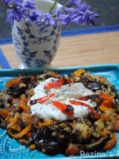A picture of Turkish Grilled eggplant salad with yogurt-mint sauce.