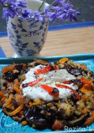 A picture of Turkish Grilled eggplant salad with yogurt-mint sauce.