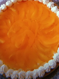 Una foto de Tarta frutal de durazno 🍑