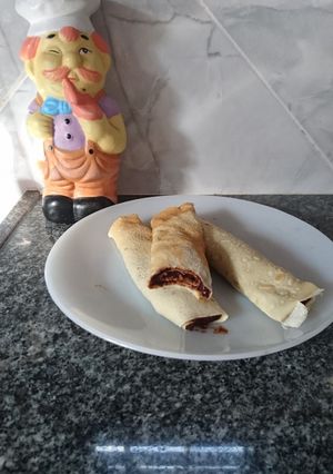 Una foto de Panqueque de choco-banana sin azúcar ni lácteos 🍫🍌🥜