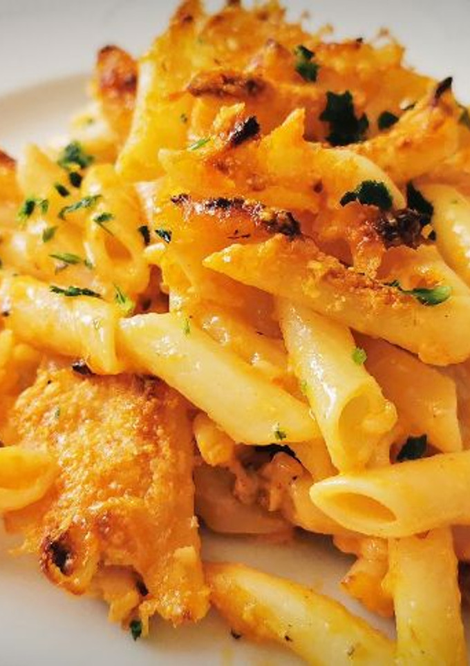 Una foto de Plumas con Bacalao y alioli gratinado