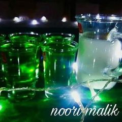 A picture of Green Elaichi Ka Sharbat. .