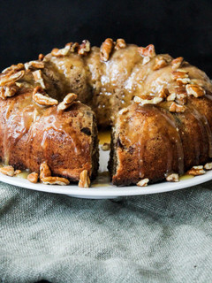 A picture of Spiced Pecan nut and Date pudding in a bundt.