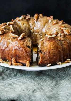 A picture of Spiced Pecan nut and Date pudding in a bundt.