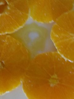 Una foto de Naranja, aceite oliva y azúcar
