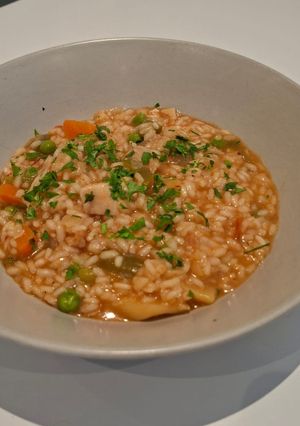 Una foto de 🍛 Arroz meloso con pollo 🍗