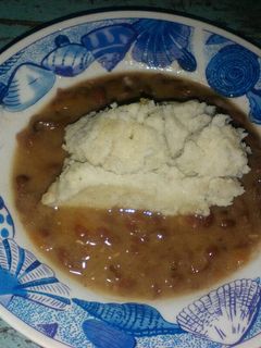 A picture of Milky ugali with buttered beans.