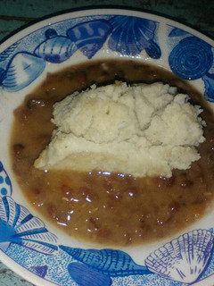 A picture of Milky ugali with buttered beans.