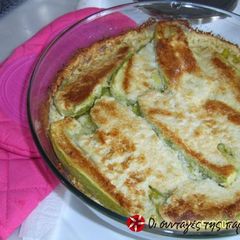 A picture of Baked zucchinis with feta cheese.