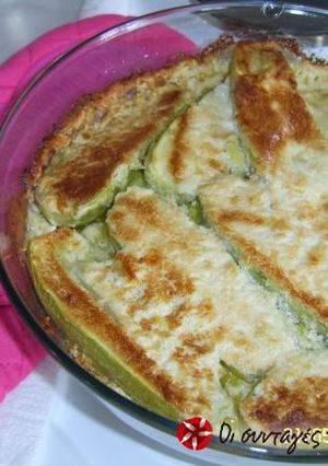 A picture of Baked zucchinis with feta cheese.