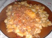 Una foto de como hacer tuco con pure de tomate y pollo